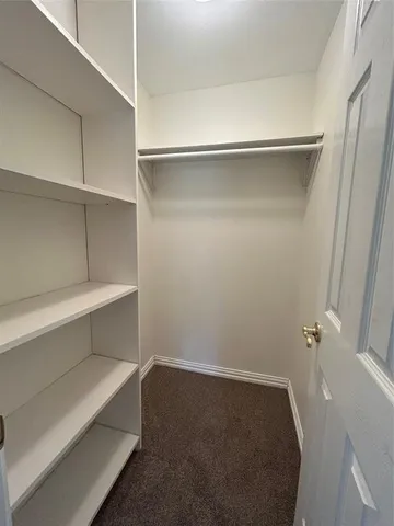 a hallway with closet