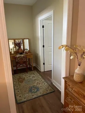 a kitchen with sink and cabinets