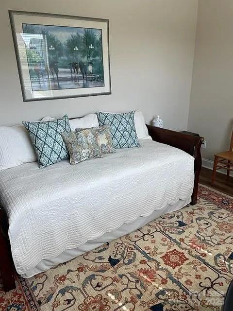 515 Bowline Drive Denver, NC 28037 - Photo 19 of 25 a large bed sitting in a bedroom next to a window