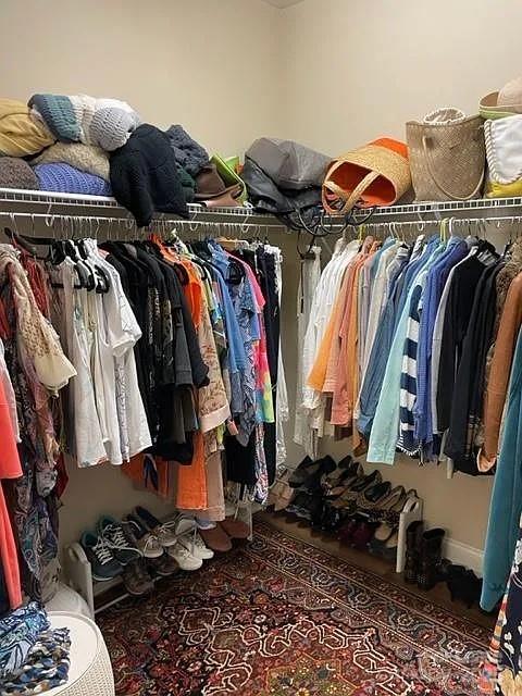 515 Bowline Drive Denver, NC 28037 - Photo 25 of 25 a view of walk in closet with clothes and shoes