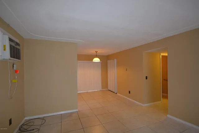 a kitchen with granite countertop a sink and a stove
