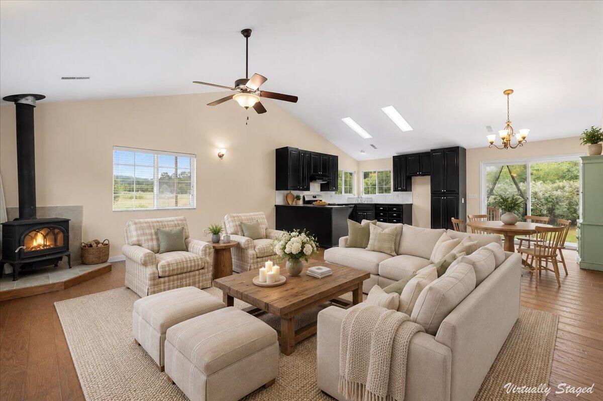 1196 Freshwater Road Eureka, CA 95503 - Photo 10 of 34 a living room with fireplace furniture and a flat screen tv