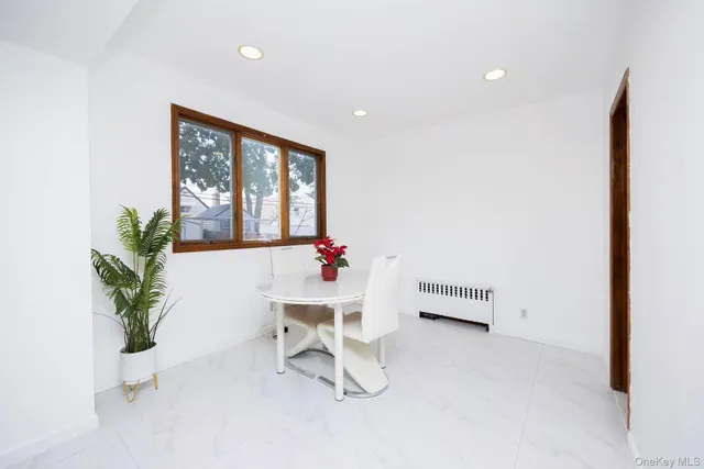 a workspace with furniture and window