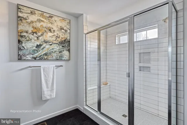 a bathroom with a large window