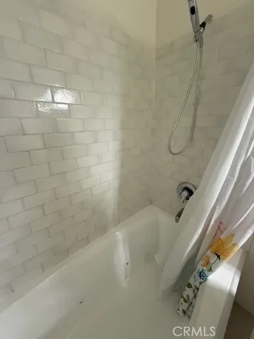 a bathroom with a bathtub