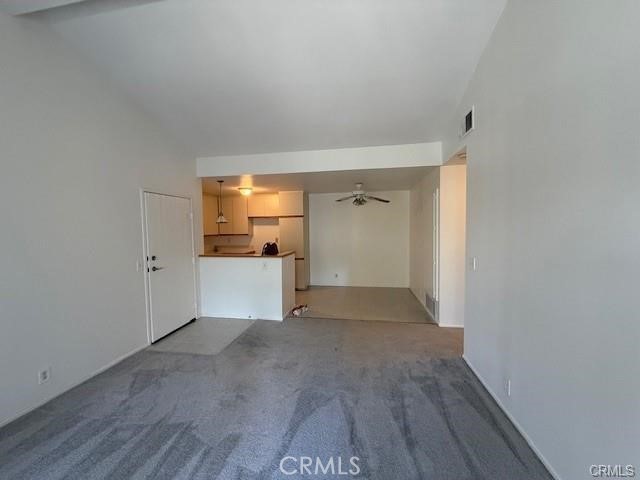27648 Susan Beth Way, Unit H Saugus, CA 91350 - Photo 7 of 21 a view of a kitchen with a refrigerator and a window