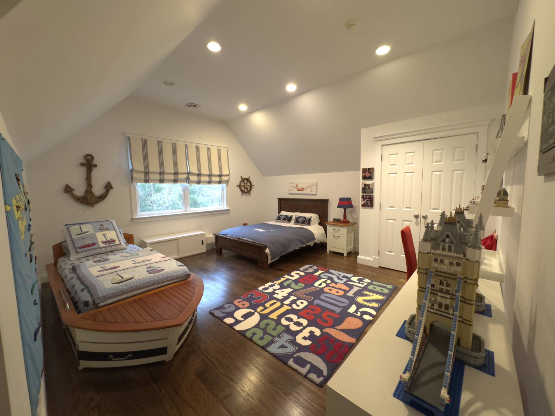 206 Bull Path East Hampton, NY 11937 - Photo 14 of 22 a living room with furniture and a flat screen tv