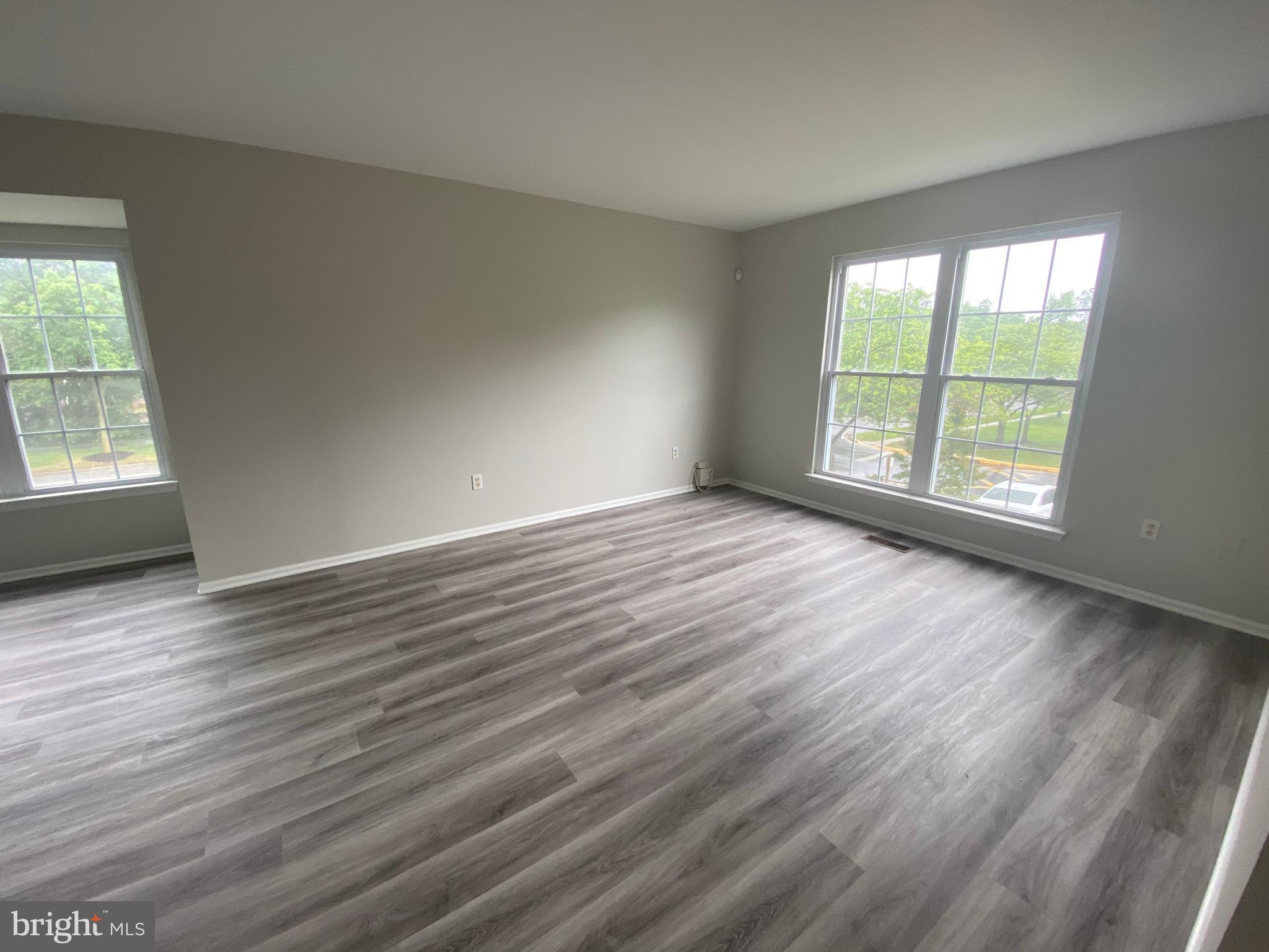 2450 Winding Ridge Road Odenton, MD 21113 - Photo 3 of 40 Living Room with luxury vinyl flooring