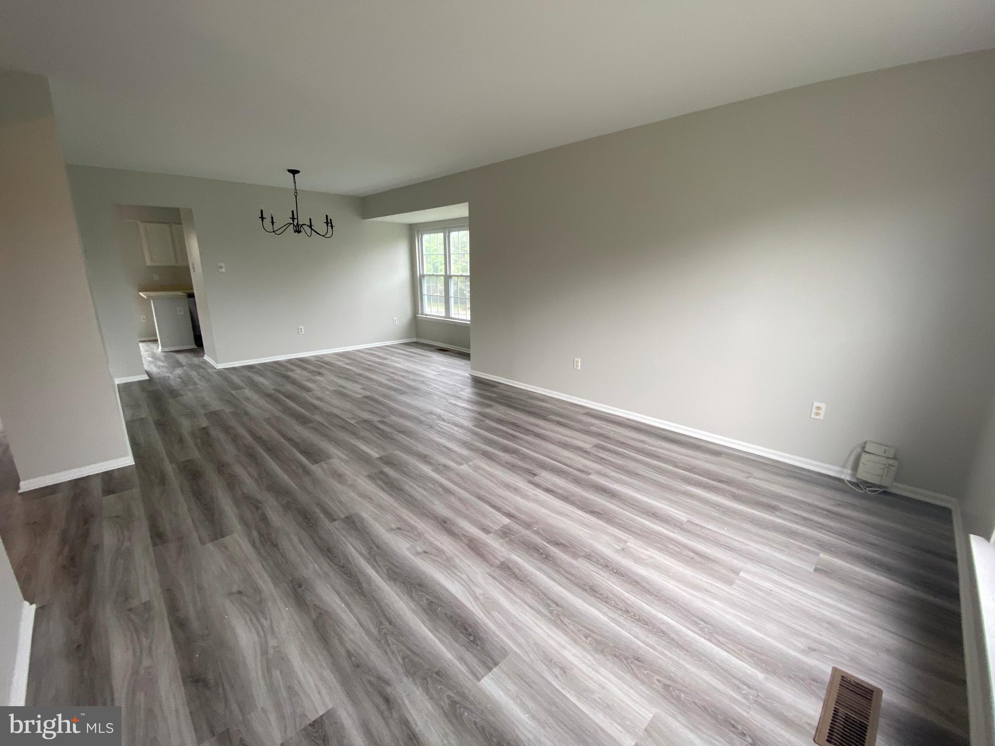 2450 Winding Ridge Road Odenton, MD 21113 - Photo 4 of 40 Living Room with luxury vinyl flooring
