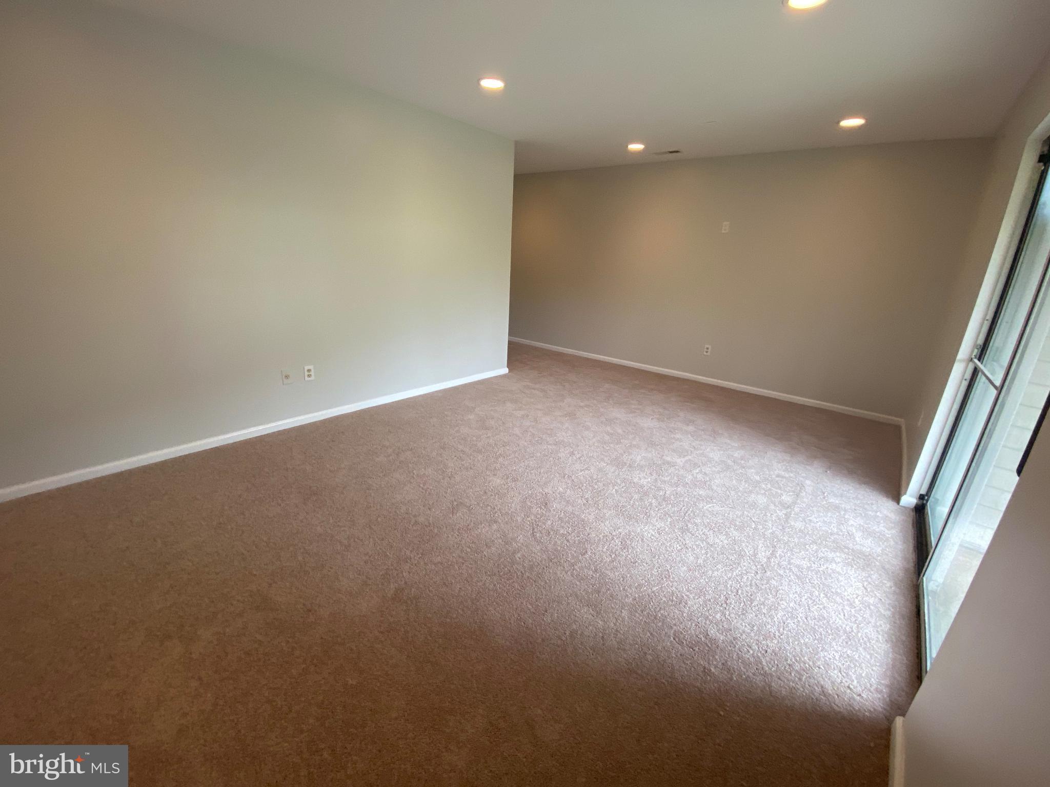 2450 Winding Ridge Road Odenton, MD 21113 - Photo 37 of 40 Lower level Family Room with wall to wall carpet
