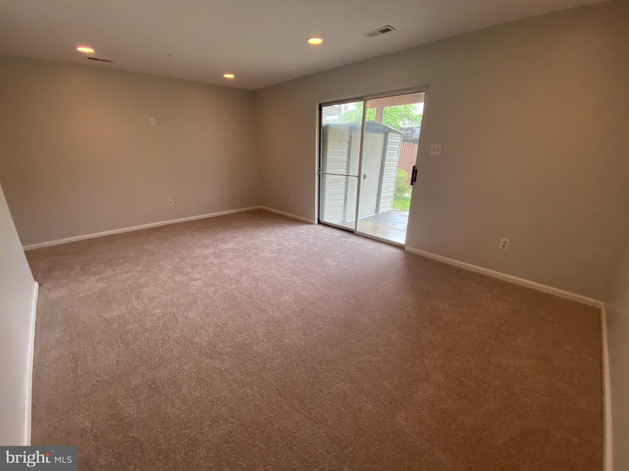2450 Winding Ridge Road Odenton, MD 21113 - Photo 38 of 40 Lower level Family Room with wall to wall carpet