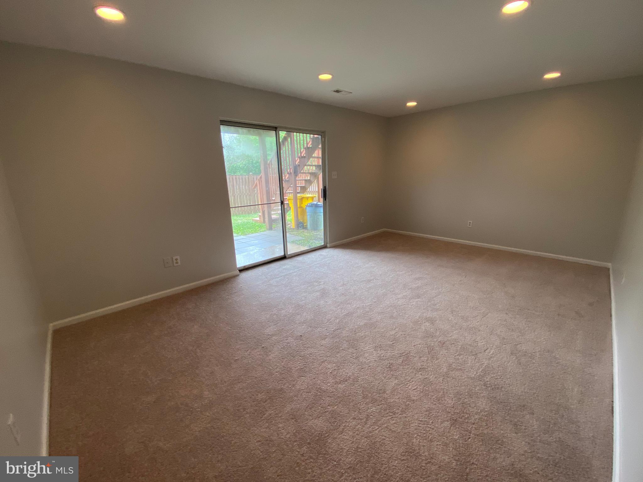 2450 Winding Ridge Road Odenton, MD 21113 - Photo 39 of 40 Lower level Family Room with wall to wall carpet