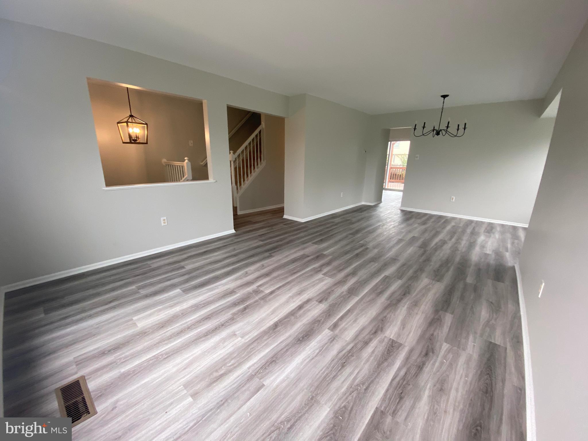 2450 Winding Ridge Road Odenton, MD 21113 - Photo 5 of 40 Living Room with luxury vinyl flooring