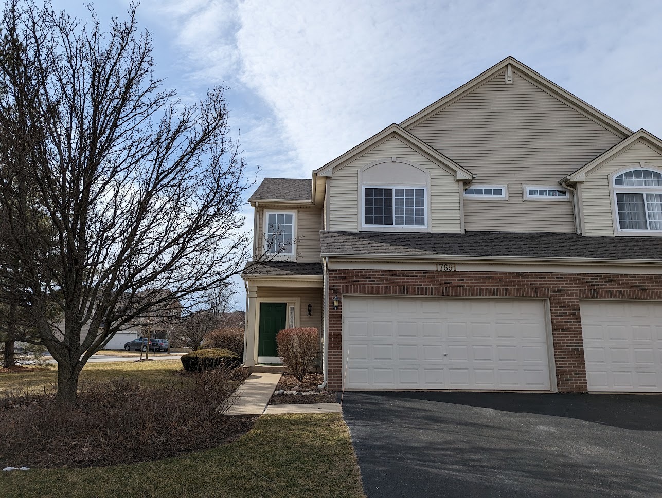 Undisclosed Address Lockport, IL 60441 - Photo 1 of 17 a view of a house with a yard