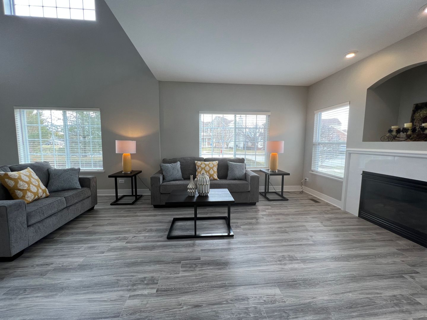Undisclosed Address Lockport, IL 60441 - Photo 6 of 17 a living room with furniture and a fireplace