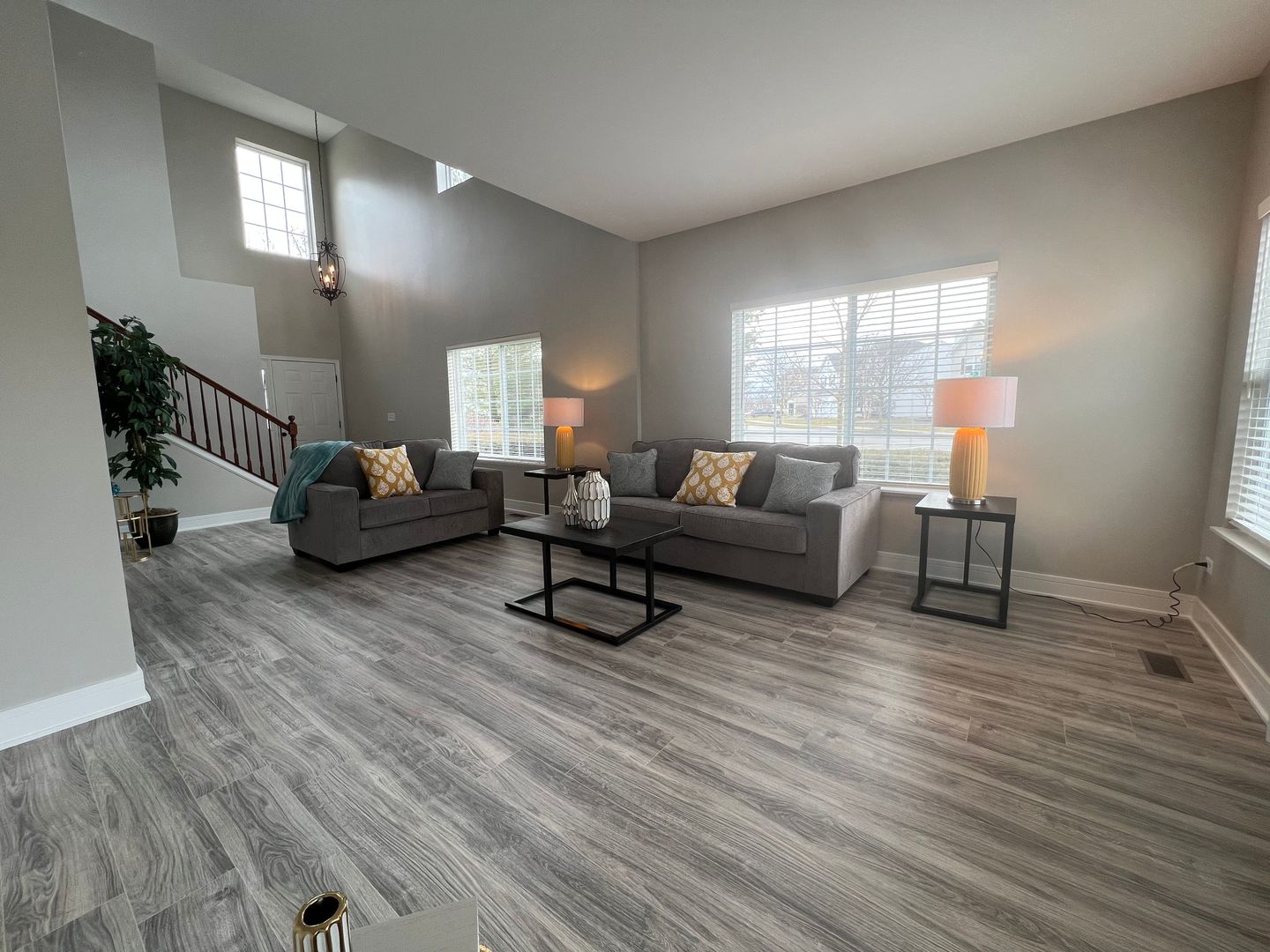 Undisclosed Address Lockport, IL 60441 - Photo 7 of 17 a living room with furniture and a wooden floor