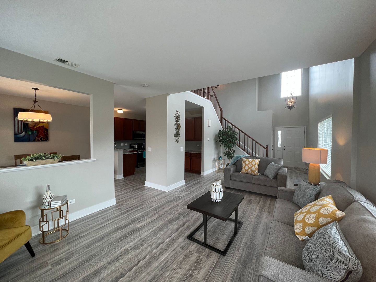 Undisclosed Address Lockport, IL 60441 - Photo 8 of 17 a living room with furniture and a flat screen tv