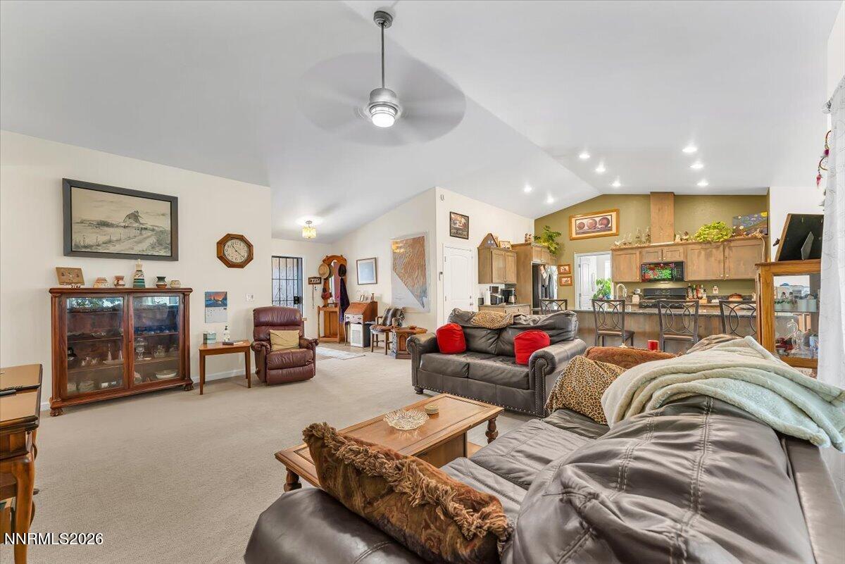 1197 Sky Ridge Drive Fallon, NV 89406 - Photo 10 of 79 a living room with furniture and a flat screen tv
