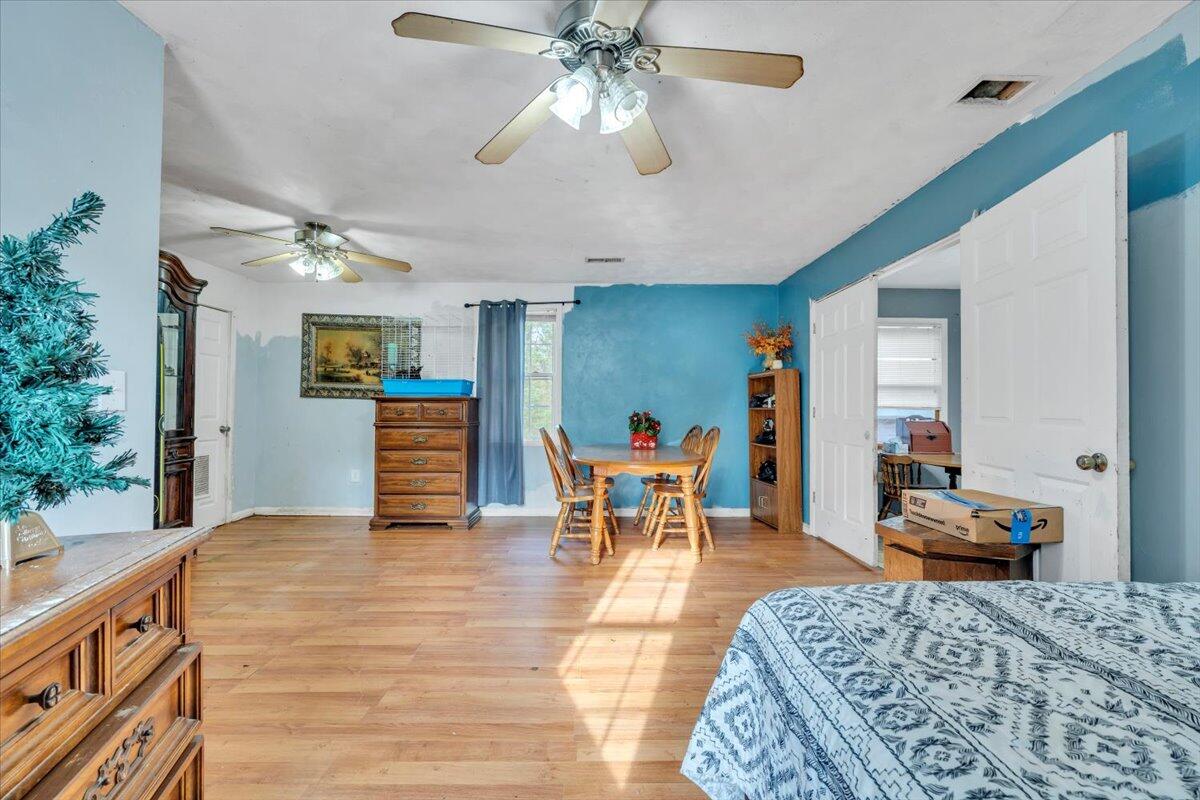 68 Old Sawmill Road Blue Ridge, VA 24064 - Photo 16 of 43 a living room with furniture and a dining table