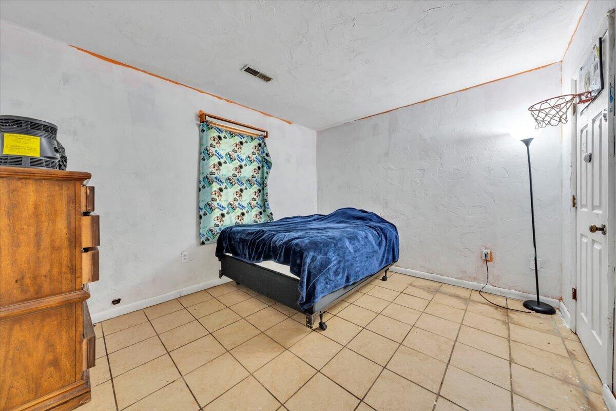 68 Old Sawmill Road Blue Ridge, VA 24064 - Photo 25 of 43 a spacious bedroom with a bed and a shower