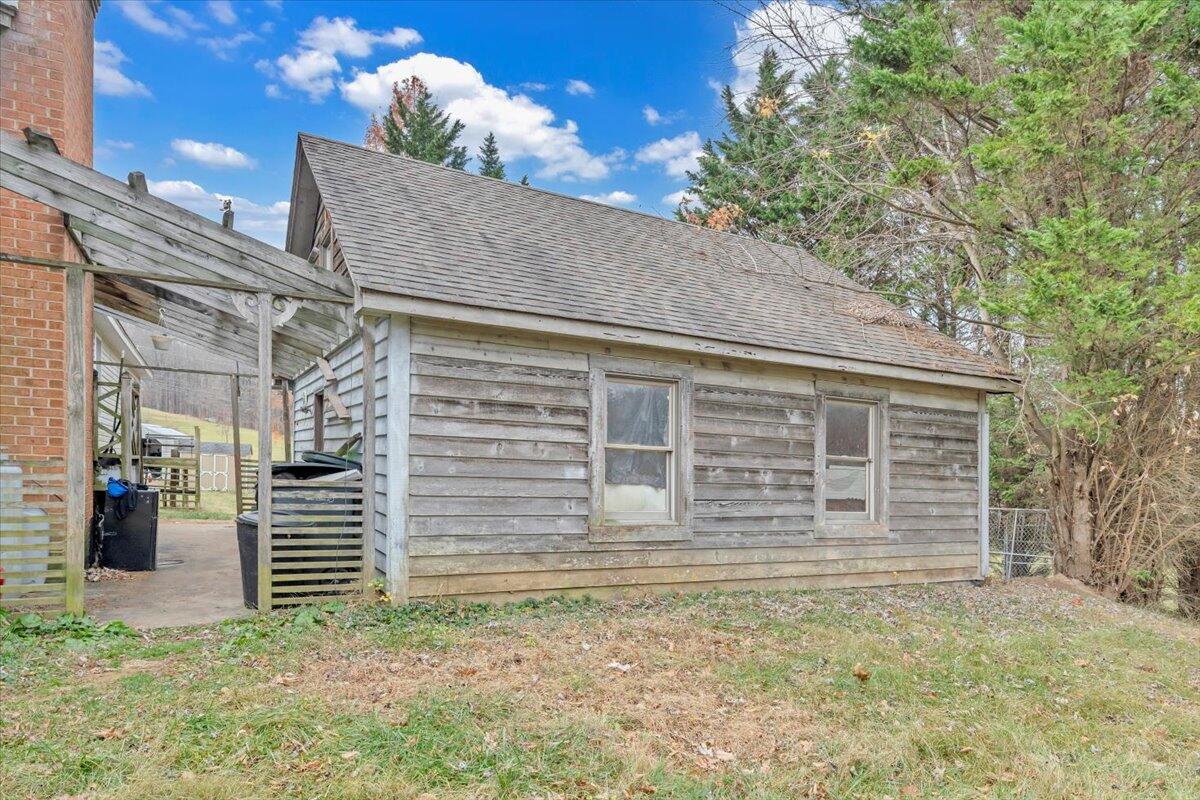 68 Old Sawmill Road Blue Ridge, VA 24064 - Photo 34 of 43 a front view of a house with a yard