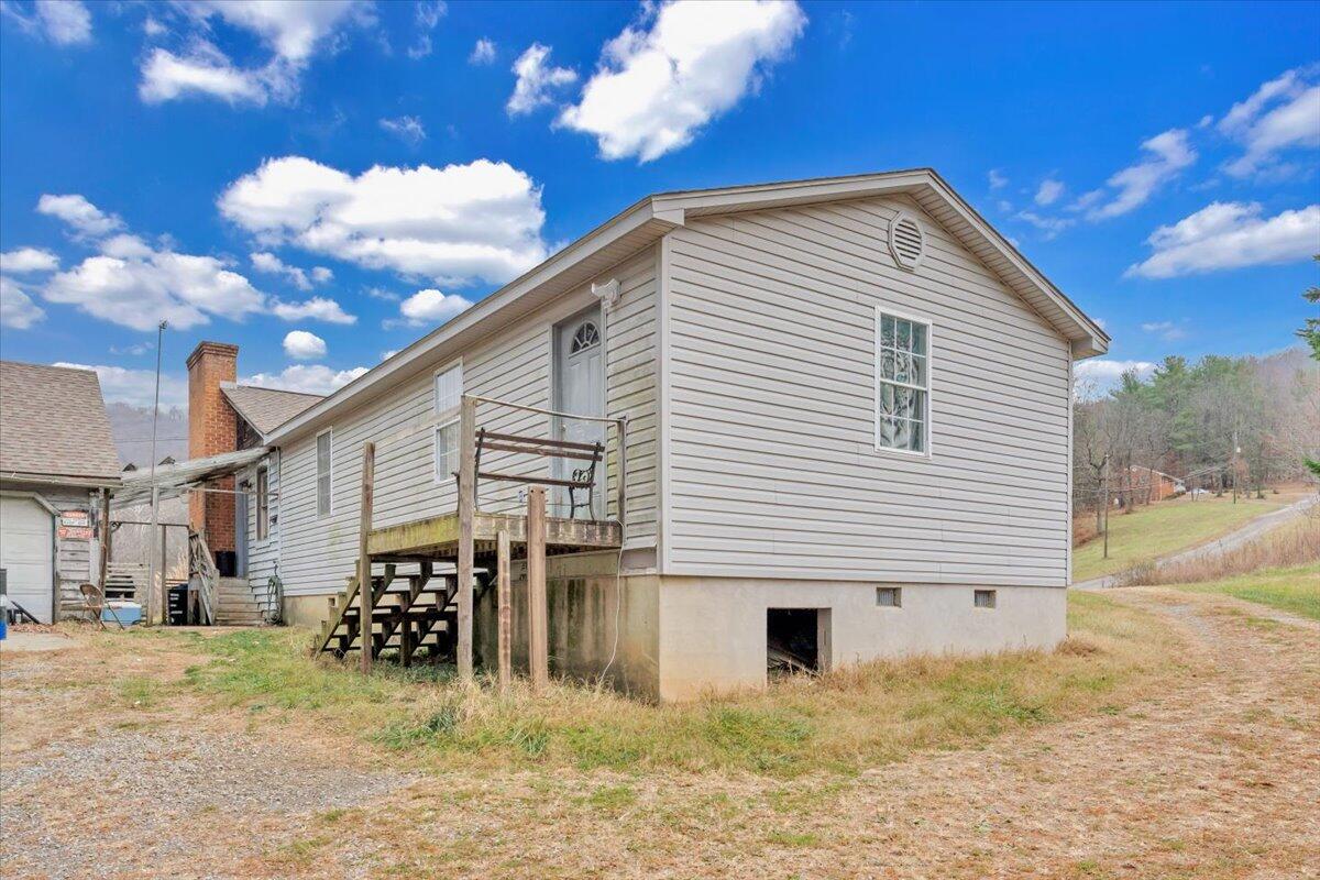 68 Old Sawmill Road Blue Ridge, VA 24064 - Photo 38 of 43 a view of a house with a yard