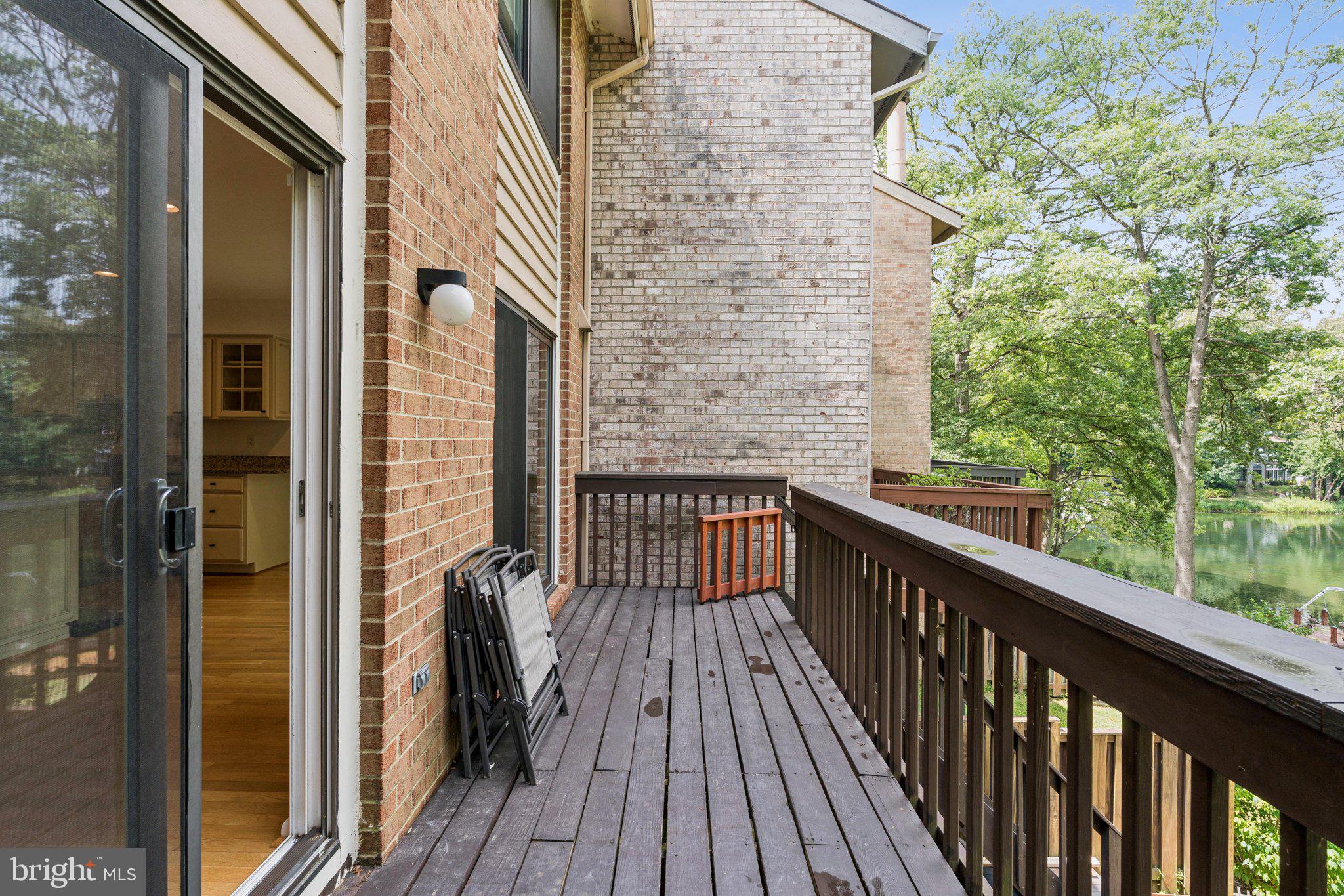 2009 Swans Neck Way Reston, VA 20191 - Photo 12 of 37 a view of balcony with wooden floor