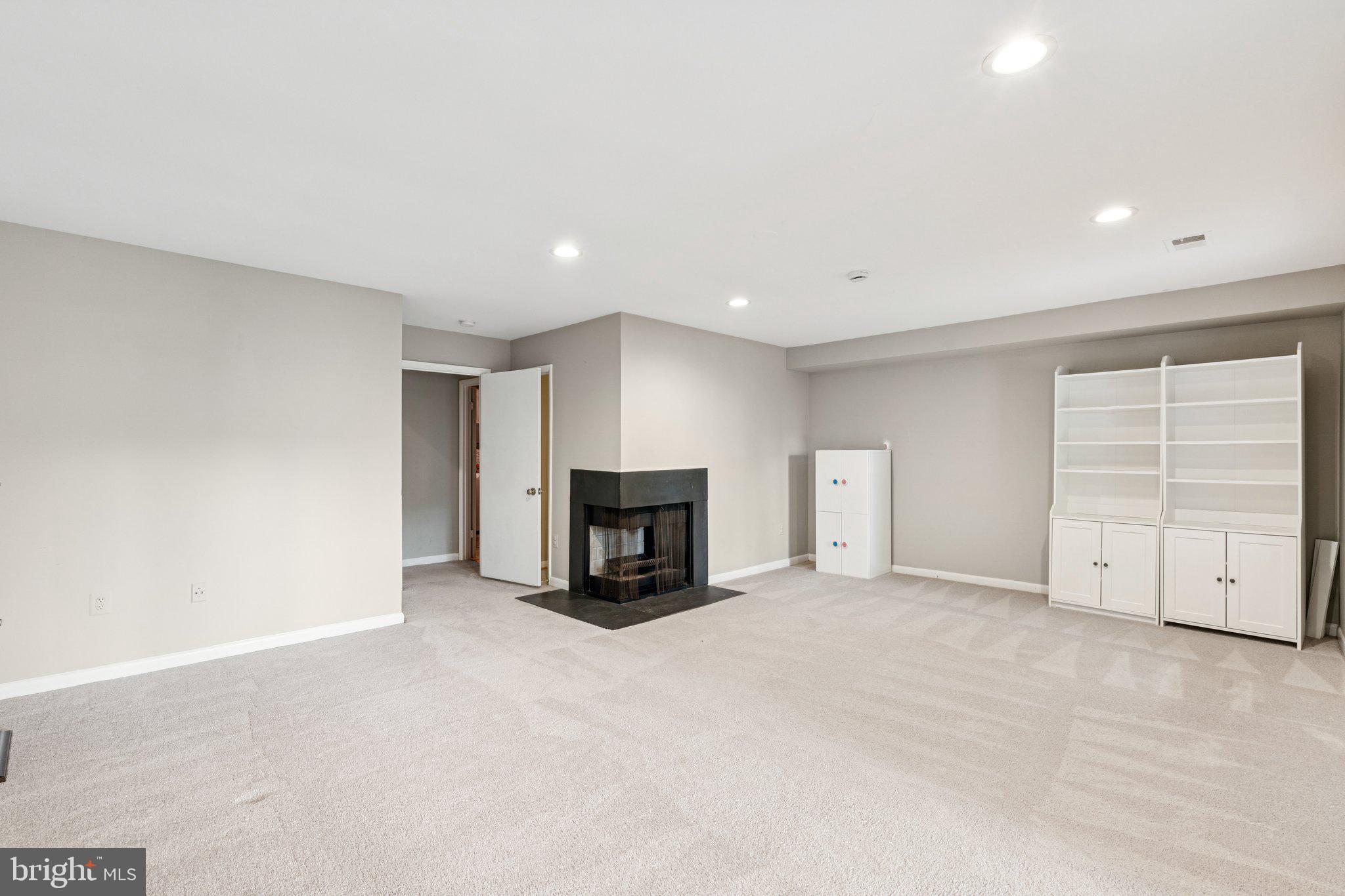 2009 Swans Neck Way Reston, VA 20191 - Photo 16 of 37 a view of an empty room with a fireplace