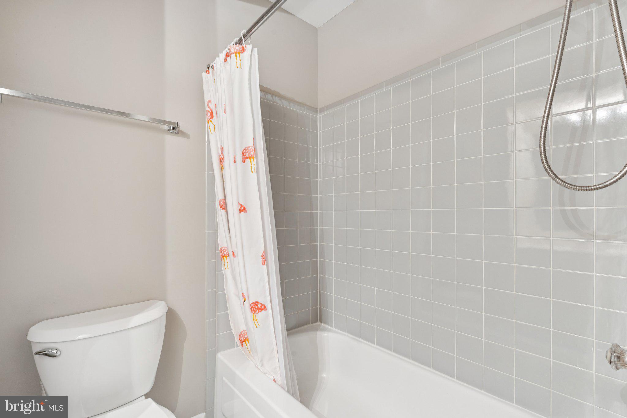 2009 Swans Neck Way Reston, VA 20191 - Photo 19 of 37 a bathroom with a toilet and a shower