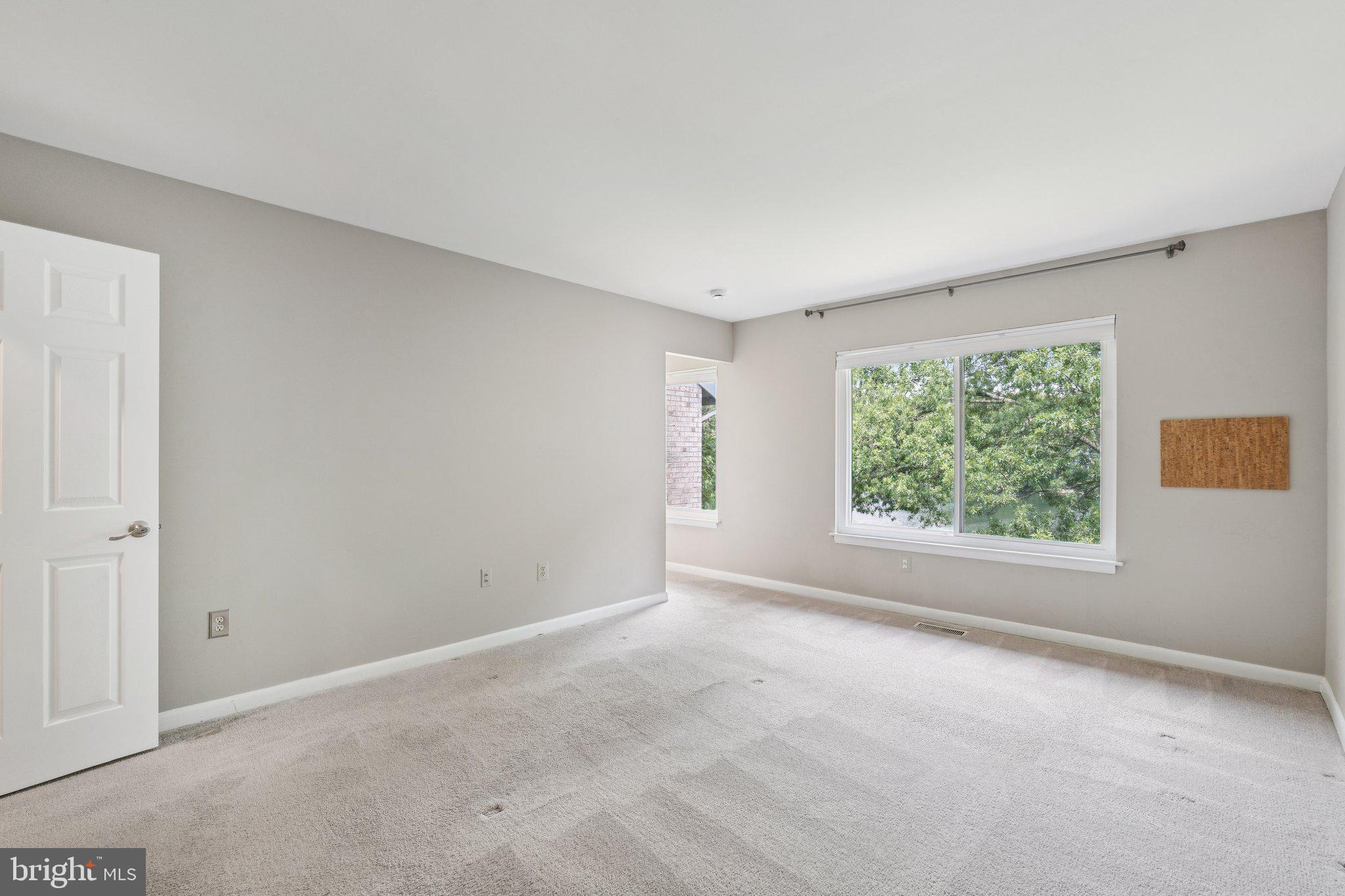 2009 Swans Neck Way Reston, VA 20191 - Photo 20 of 37 a view of an empty room with a window