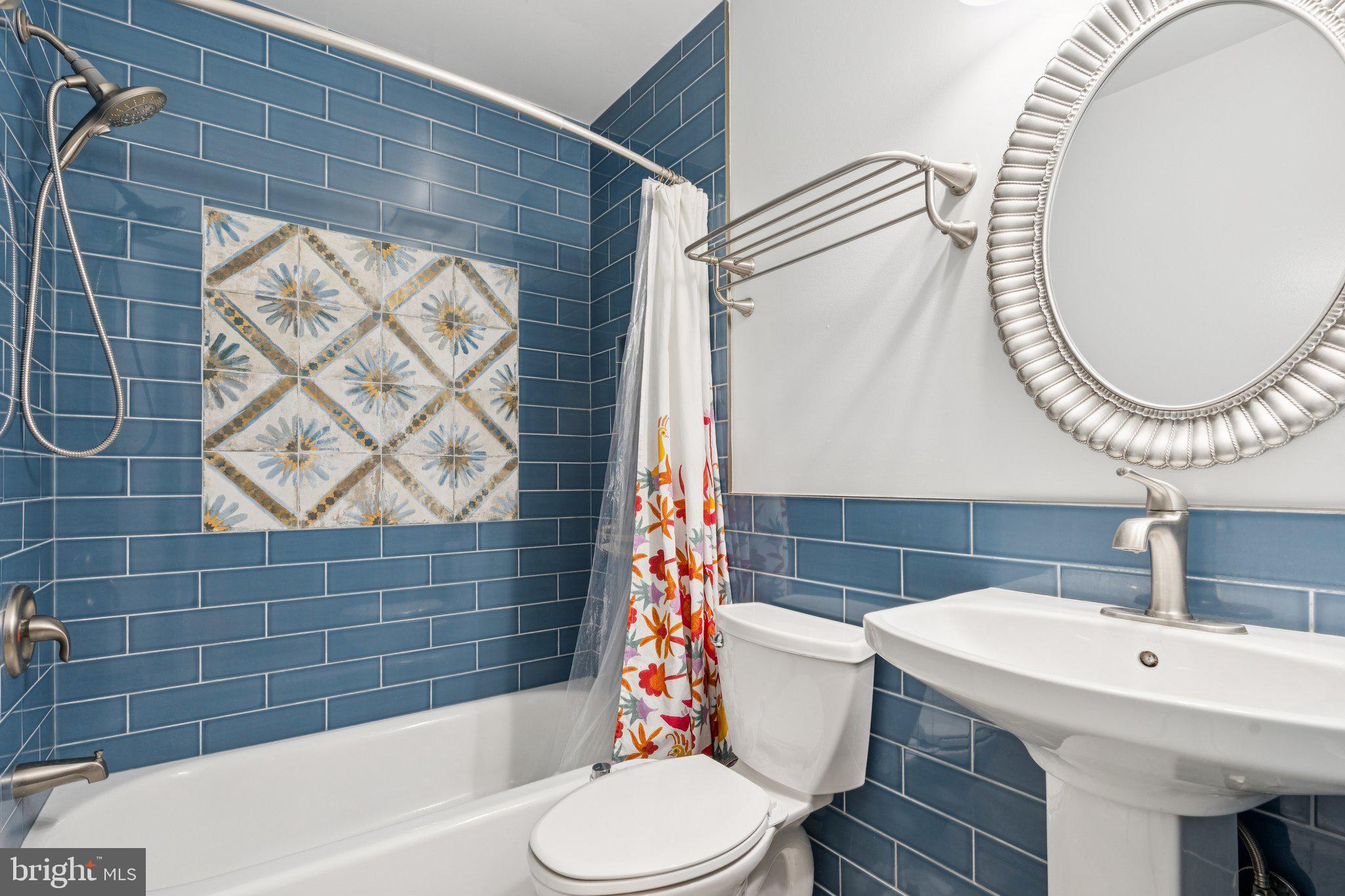 2009 Swans Neck Way Reston, VA 20191 - Photo 25 of 37 a bathroom with a sink a toilet and shower