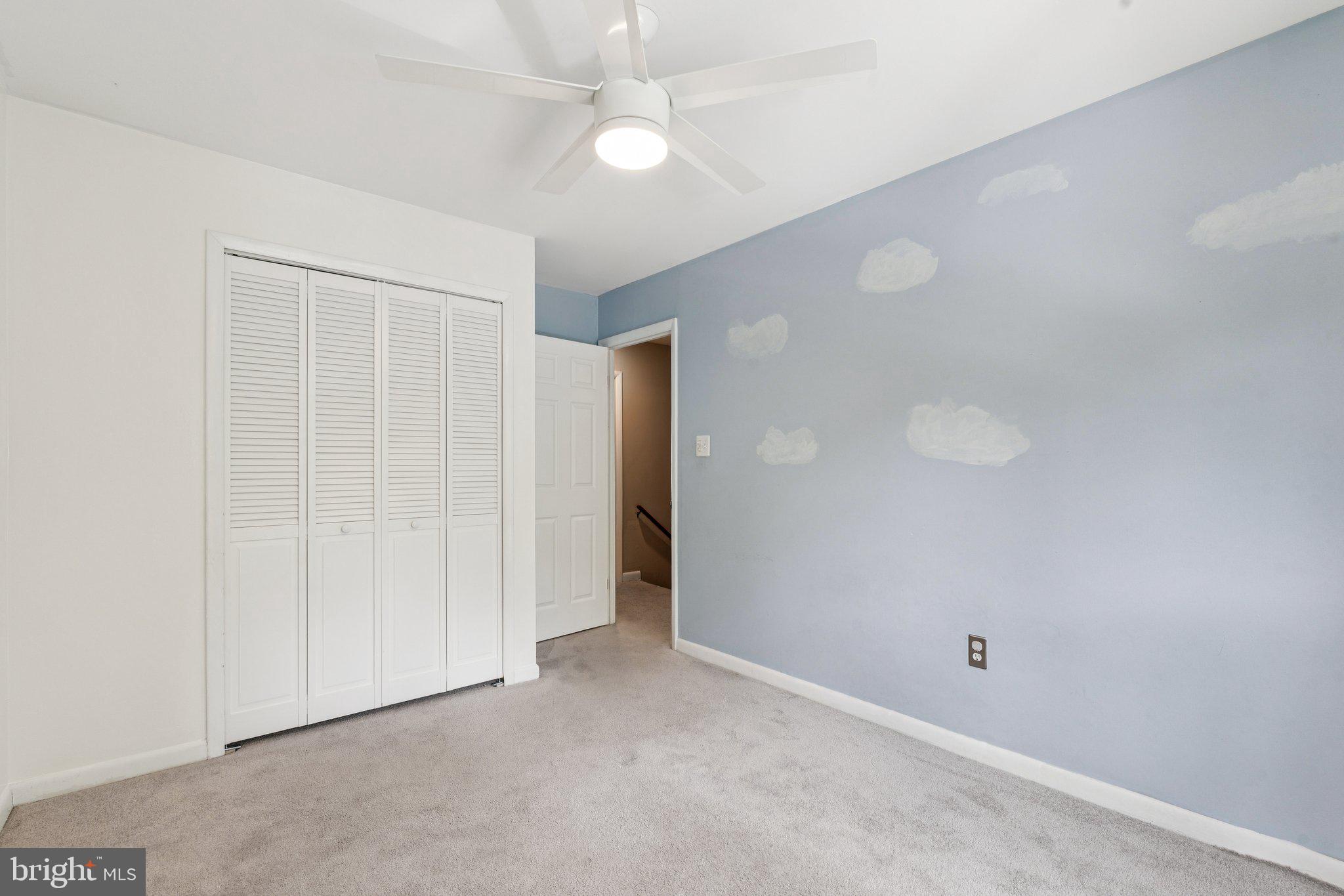 2009 Swans Neck Way Reston, VA 20191 - Photo 28 of 37 an empty room with a ceiling fan and a window