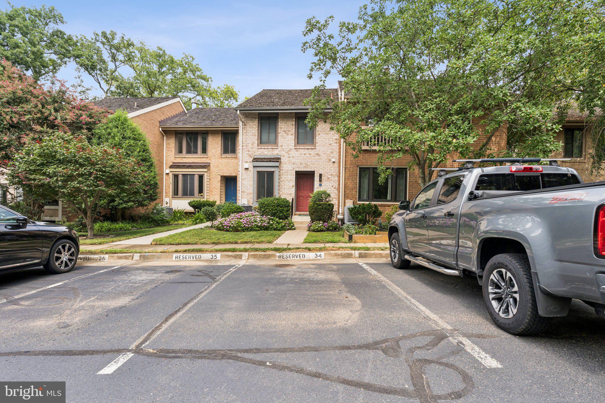 2009 Swans Neck Way Reston, VA 20191 - Photo 3 of 37 a view of a car parked in front of a house