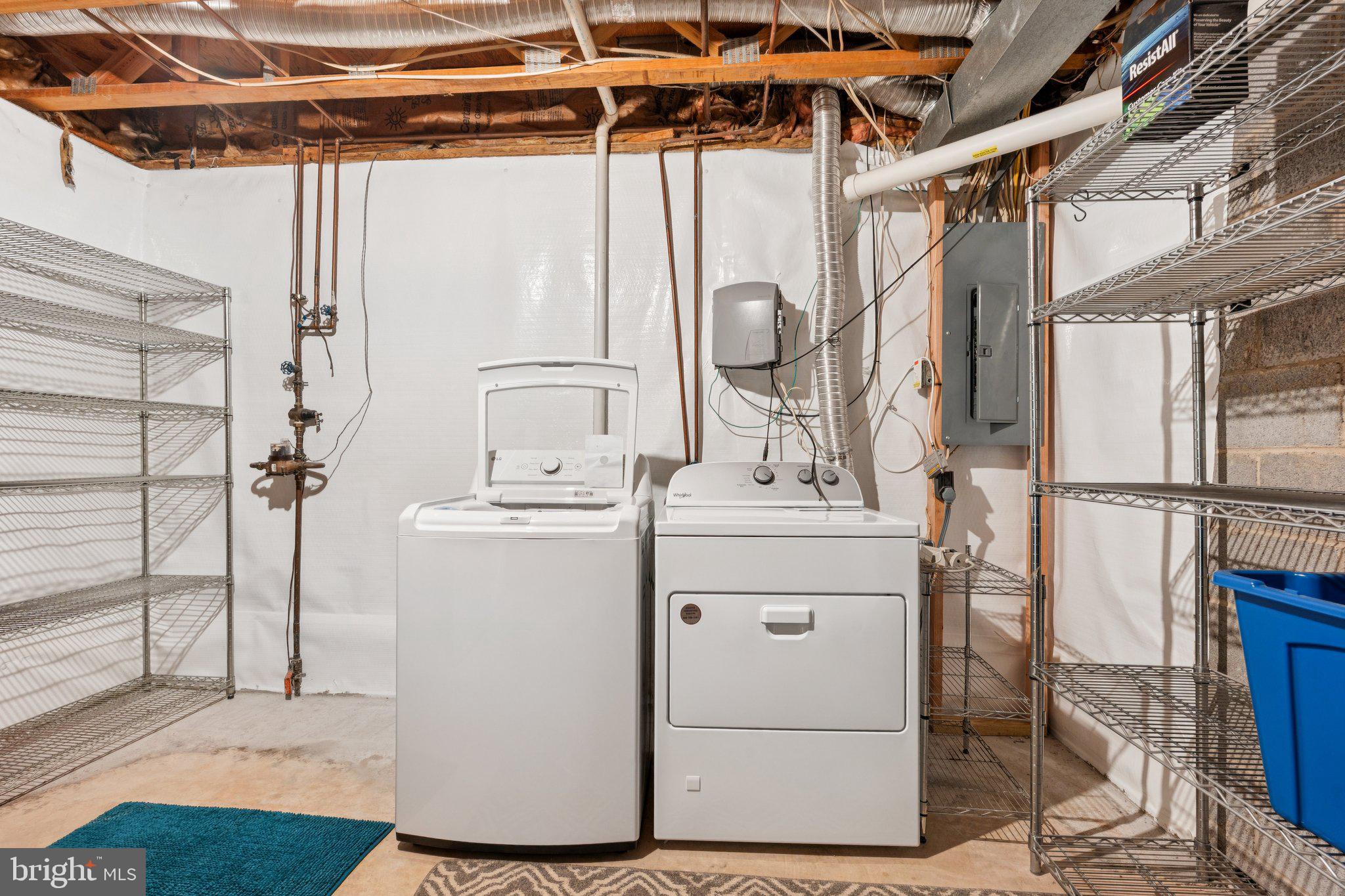 2009 Swans Neck Way Reston, VA 20191 - Photo 33 of 37 a utility room with cabinets and washer dryer