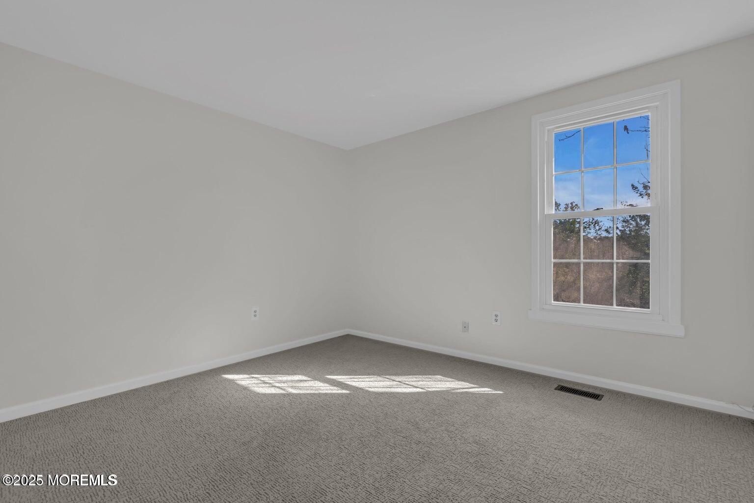 58 Garden Avenue Island Heights, NJ 08732 - Photo 15 of 46 an empty room with a empty space and window