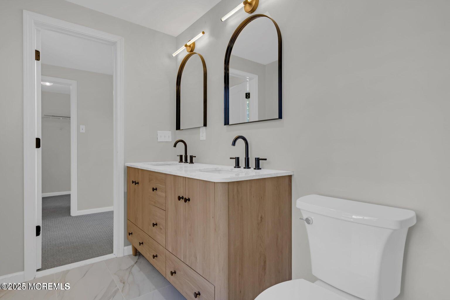 58 Garden Avenue Island Heights, NJ 08732 - Photo 22 of 46 a bathroom with a sink and mirror