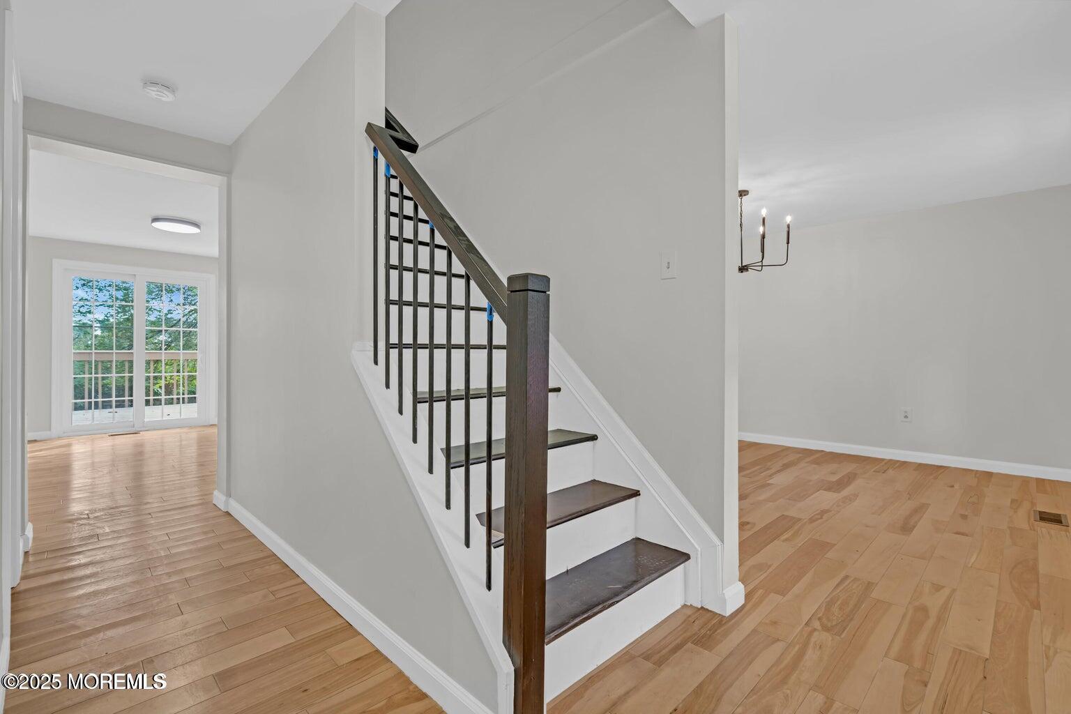 58 Garden Avenue Island Heights, NJ 08732 - Photo 30 of 46 a view of staircase with wooden floor and white walls