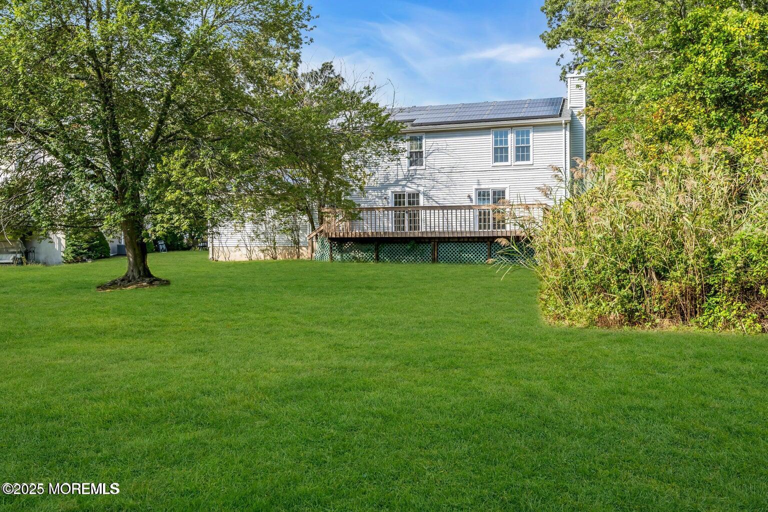 58 Garden Avenue Island Heights, NJ 08732 - Photo 43 of 46 a view of a house with a backyard