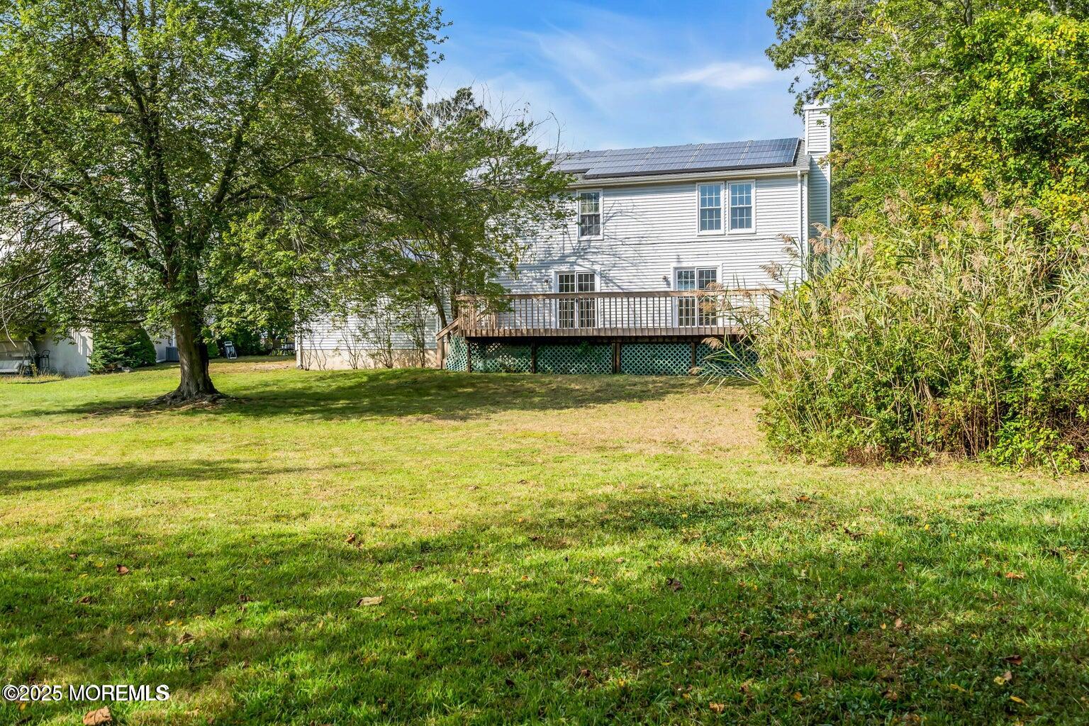 58 Garden Avenue Island Heights, NJ 08732 - Photo 45 of 46 a view of a house with a yard balcony and a tree