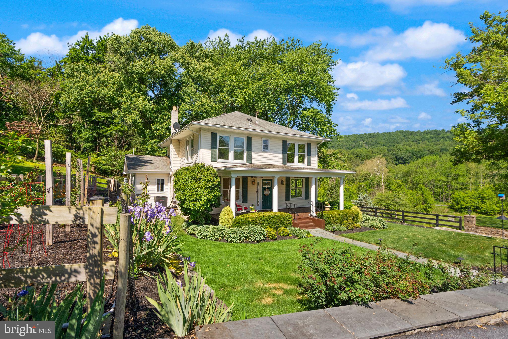 37151 Branchriver Road Purcellville, VA 20132 - Photo 16 of 63 a front view of a house with a yard