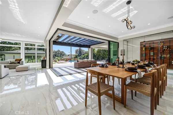 a kitchen with stainless steel appliances granite countertop a stove and a refrigerator