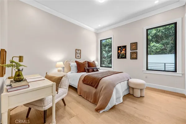 a living room with furniture a projector and a projector