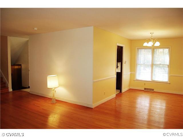 14333 Aldengate Road Midlothian, VA 23114 - Photo 4 of 19 Dining Room - Wood floors and chair rail. Open to