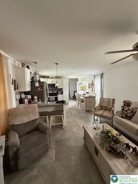 7468 Continental Circle Trexlertown, PA 18087 - Photo 4 of 13 a living room with furniture and a couch
