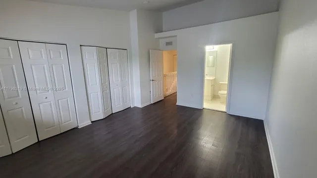 a view of a entrance with wooden floor