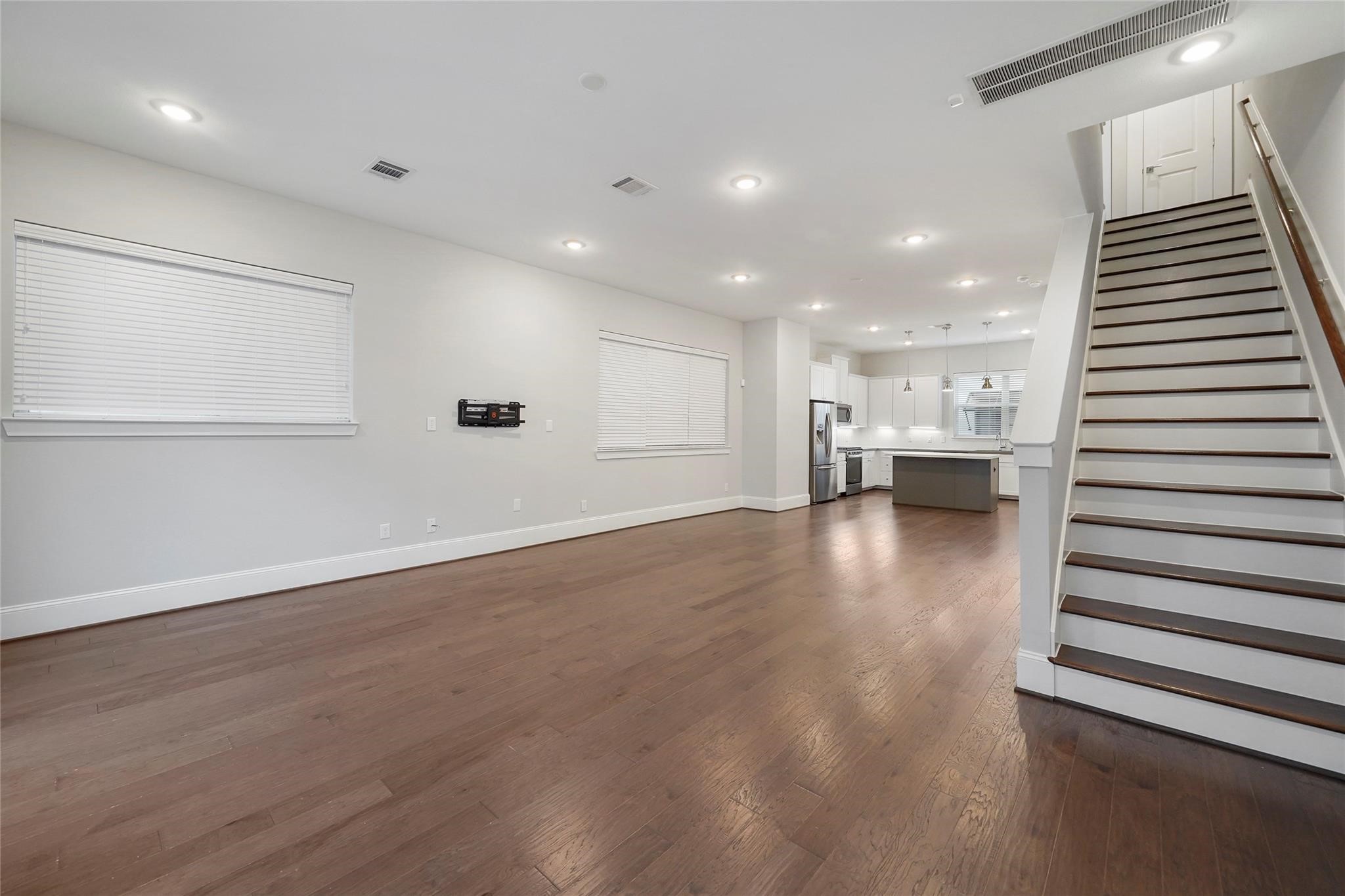 1268 North Post Oak Road, Unit A Houston, TX 77055 - Photo 11 of 32 a view of kitchen with stainless steel appliances refrigerator and window