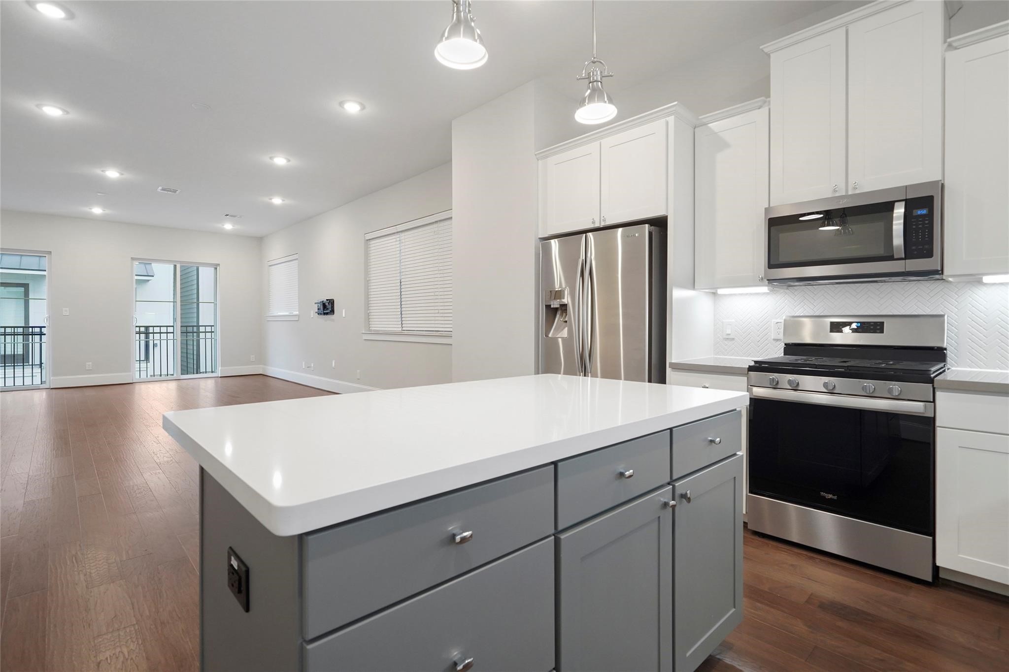 1268 North Post Oak Road, Unit A Houston, TX 77055 - Photo 14 of 32 a kitchen with a sink appliances and cabinets