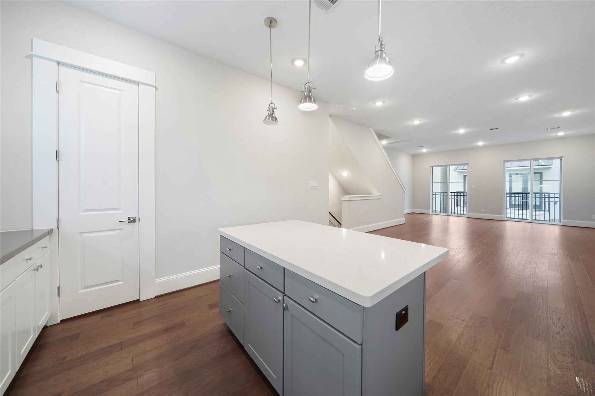 1268 North Post Oak Road, Unit A Houston, TX 77055 - Photo 15 of 32 a view of a hallway with wooden floor