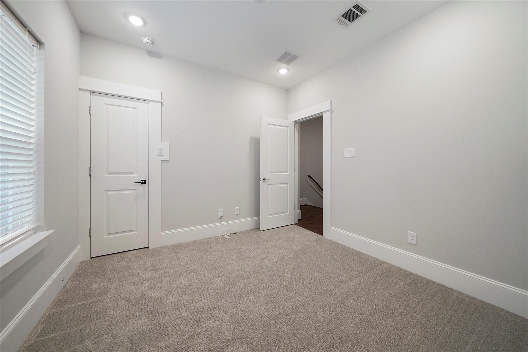 1268 North Post Oak Road, Unit A Houston, TX 77055 - Photo 22 of 32 an empty room with an entryway