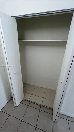 a view of storage and utility room with a washer and dryer
